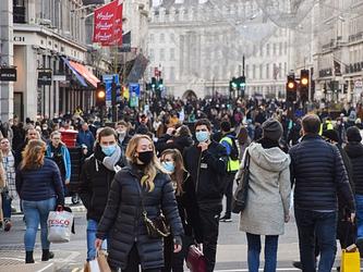 People on Regent's Street, London, wearing masks